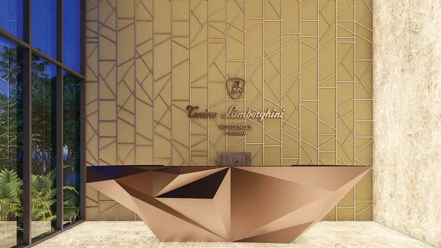 Tonino Lamborghini Residences - Branded reception desk and signature lobby wall