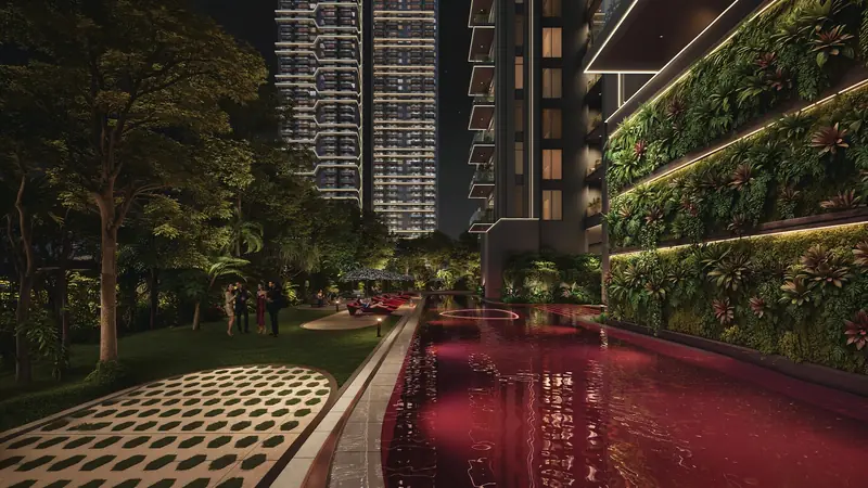 Tonino Lamborghini Residences - Illuminated swimming pool with vertical garden wall at night